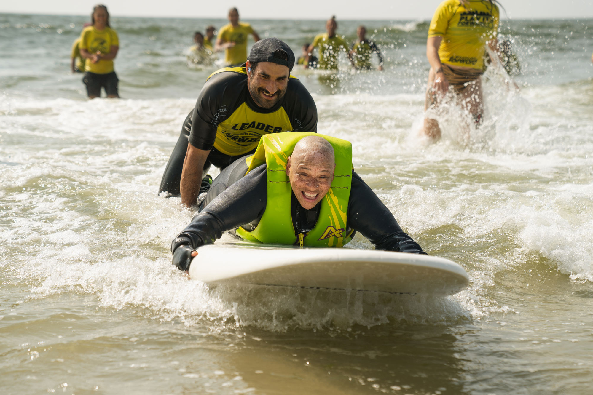 Tracey White, Michael Kololyan, Locals Surf School - Photo: Jason Belsky