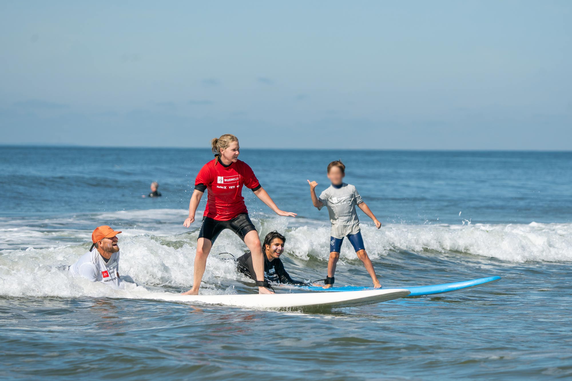 Amy Schumer and Son Gene with Professional Big Wave Surfer Will Skudin and Surf Instructor Ryder